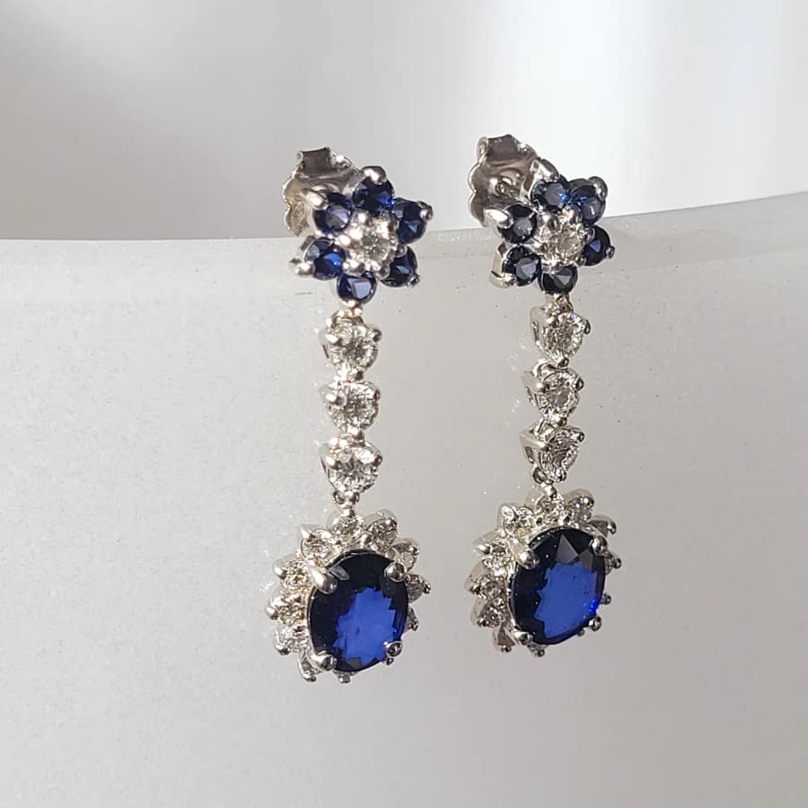 Royal blue sapphire drop earrings in white gold